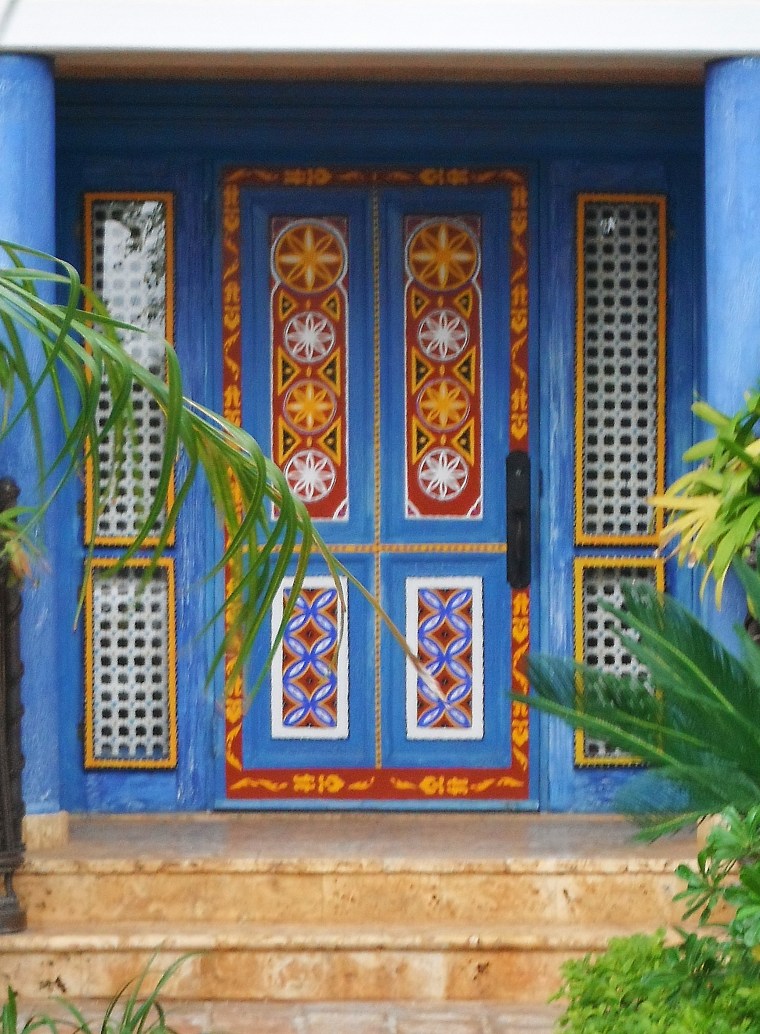 A beautiful painted door leads to a villa at the marina in Casa de Campo