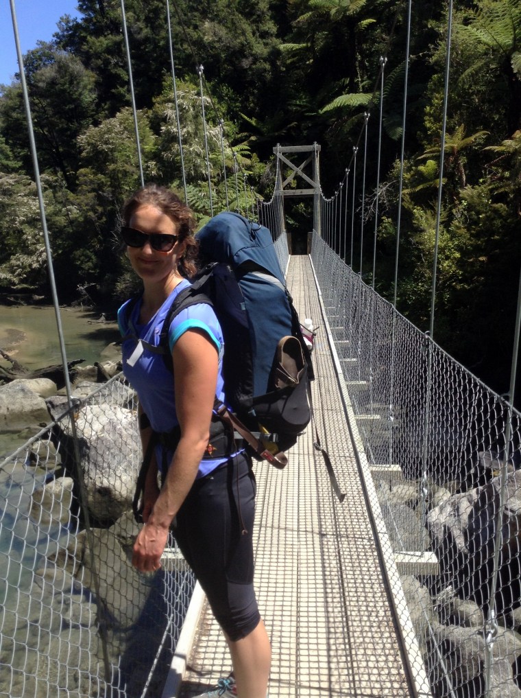 Sarah strikes a suspension bridge pose
